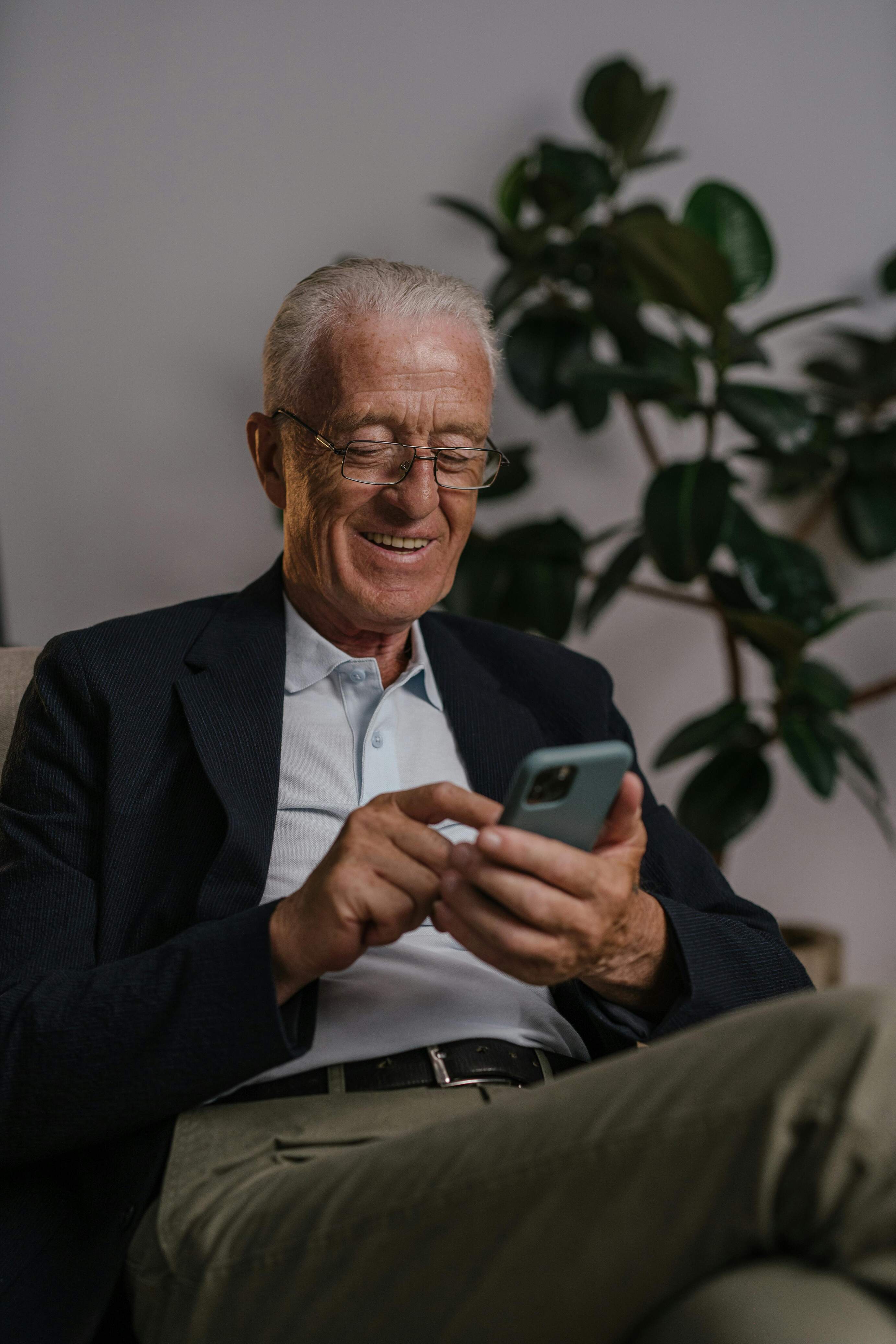Business Man Enjoying his Mobile App